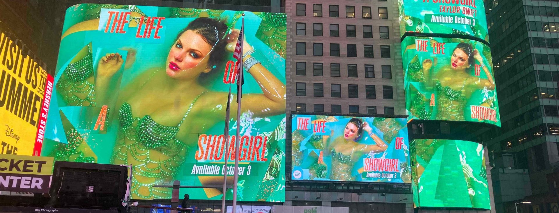 Spotify Taylor Swift The Life of a Showgirl campaign filling multiple Times Square screens